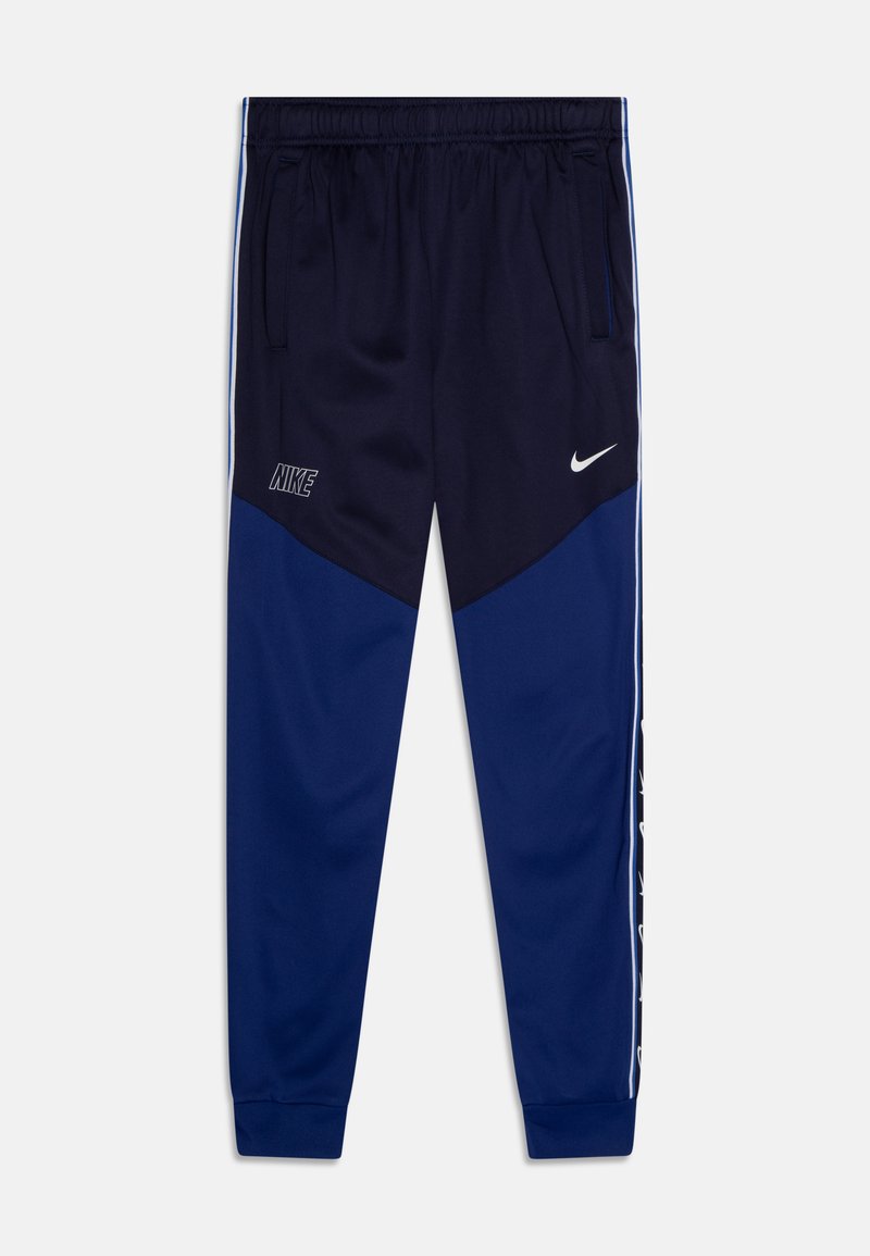 Nike Sportswear REPEAT Tracksuit bottoms deep royal blue/blackened