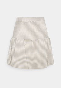 Rutigt mönstrad kjol i beige och vitt med smockad midja och volangkant. Tillverkad av lättviktsmaterial, med veck för volym.