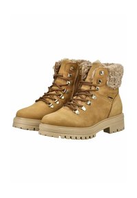 Beige Wanderschuhe mit einem Kunstfellkragen, Metallösen, Schnürsenkeln und einer dicken, robusten Gummisohle. Glatte Wildlederoberfläche. Reißverschluss an der Seite.