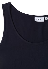 Canotta senza maniche blu navy con scollatura rotonda e etichetta del marchio bianco "CECIL" visibile sul colletto, taglia small.