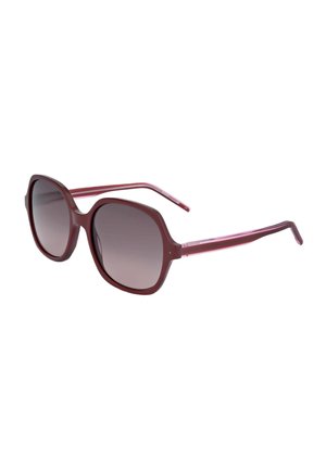 Occhiali da sole oversize viola con lenti a gradiente scuro e aste sottili, mostrati su sfondo bianco.