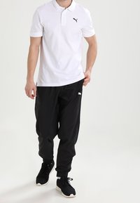 Puma Träningsbyxor - black