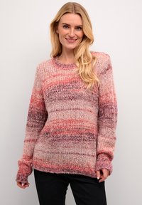 Maglione lavorato a maglia con scollatura rotonda, caratterizzato da una sfumatura di strisce rosa, rosse e viola. Filato testurizzato con polsini e orlo a coste.
