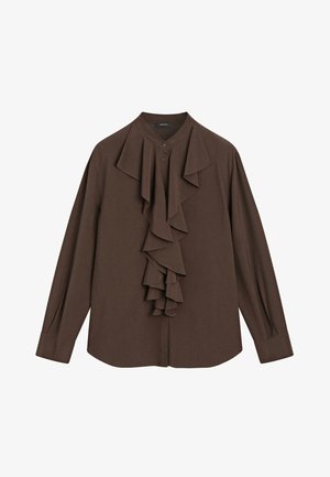 Hnědá halenka s volánkovým předním dílem, dlouhými rukávy, mandarínským límečkem a zapínáním na knoflíky. Vyrobena z měkké, hladké látky.