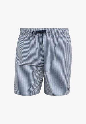 Bañador a rayas azules y blancas con cintura elástica y cordón. Tejido ligero con un corte holgado, que incluye un sutil detalle de logo.