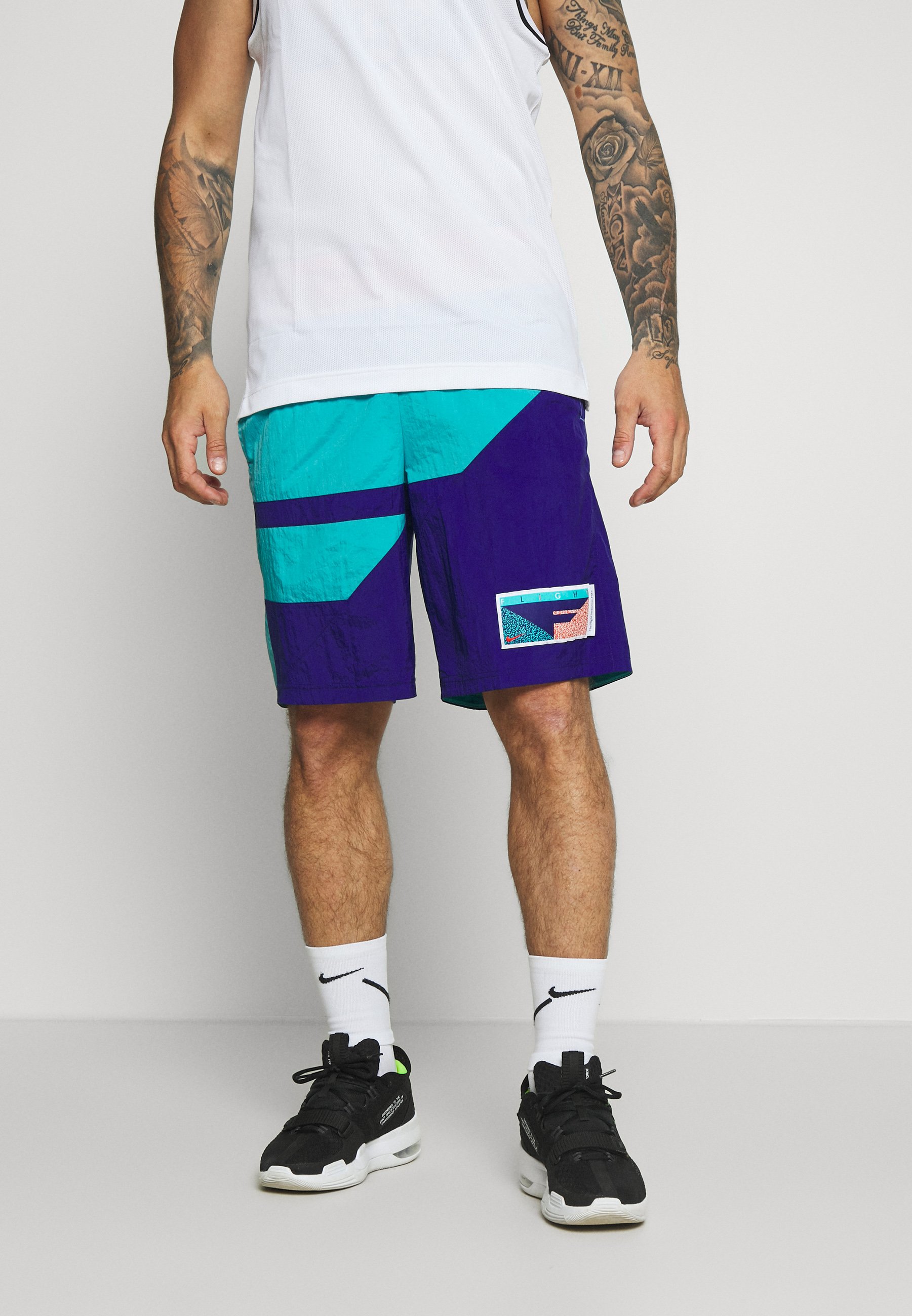 blue and purple nike shorts