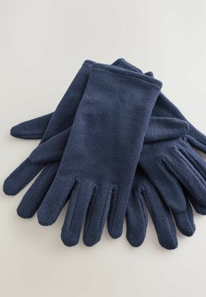 Marina blå fleecehandskar staplade, med en slät textur, fem fingrar, och utan synliga stängningar eller mönster.