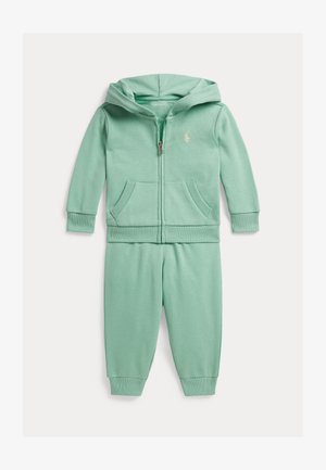 Ensemble pour tout-petit composé d'un sweat à capuche et d'un pantalon de jogging couleur vert menthe, avec fermeture éclair frontale, poches et poignets côtelés.