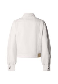 Balta cropped garām piedurknēm jaka ar aprocēm un mazu brūnganu etiķeti apakšējā labajā muguras pusē.