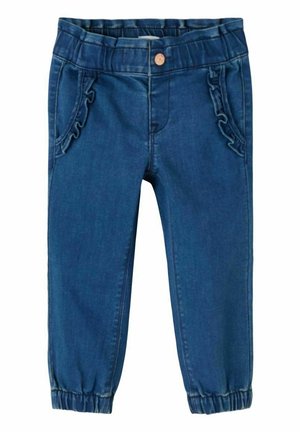 Jean bleu pour tout-petit avec taille et poignets élastiques, poches décorées avec bordure à volants et fermeture à bouton en cuivre à l'avant.