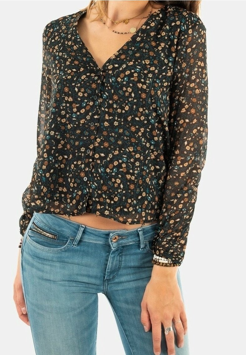 Black floral blouse with long sleeves, a V-neckline, and button closure. Features small floral patterns in brown and blue on a sheer fabric.