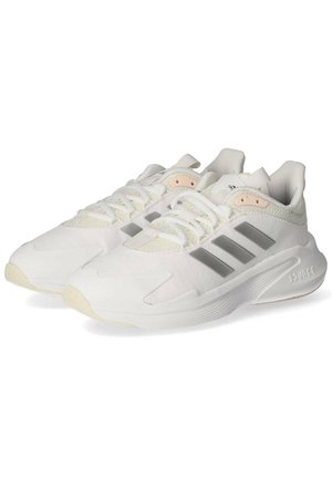 Weiße Sportschuhe mit einer strukturierten Oberfläche, ausgestattet mit grauen Streifen, hellen Akzenten, einer gepolsterten Zunge und einer Gummisohle.