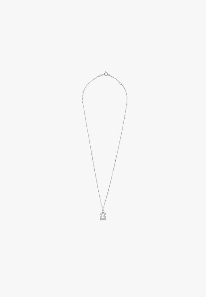 Collar de plata con una delicada cadena y un colgante de cristal, que presenta un diseño minimalista y superficies lisas y pulidas.