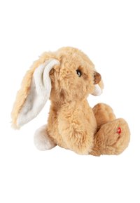 Soft brown plush bunny with white inner ears and a small round nose. Sitting posture, round paws, and a fluffy tail with a red tag.