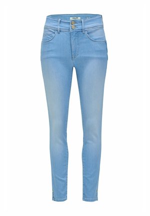 Jeans ajustados de denim de color azul claro, con dos bolsillos frontales, cierre de cremallera y botón. Presenta cremalleras en los tobillos para un ajuste ajustable.