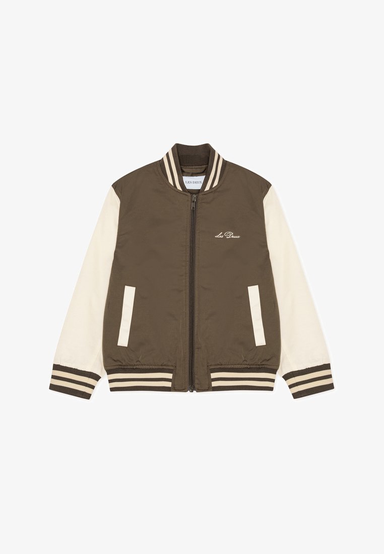 Καφέ και κρεμ μπουφάν bomber με ριγέ πλεκτά μανσέτες και γιακά, φερμουάρ κλεισίματος και κεντημένο λογότυπο στο στήθος. Λείο υφάδι.