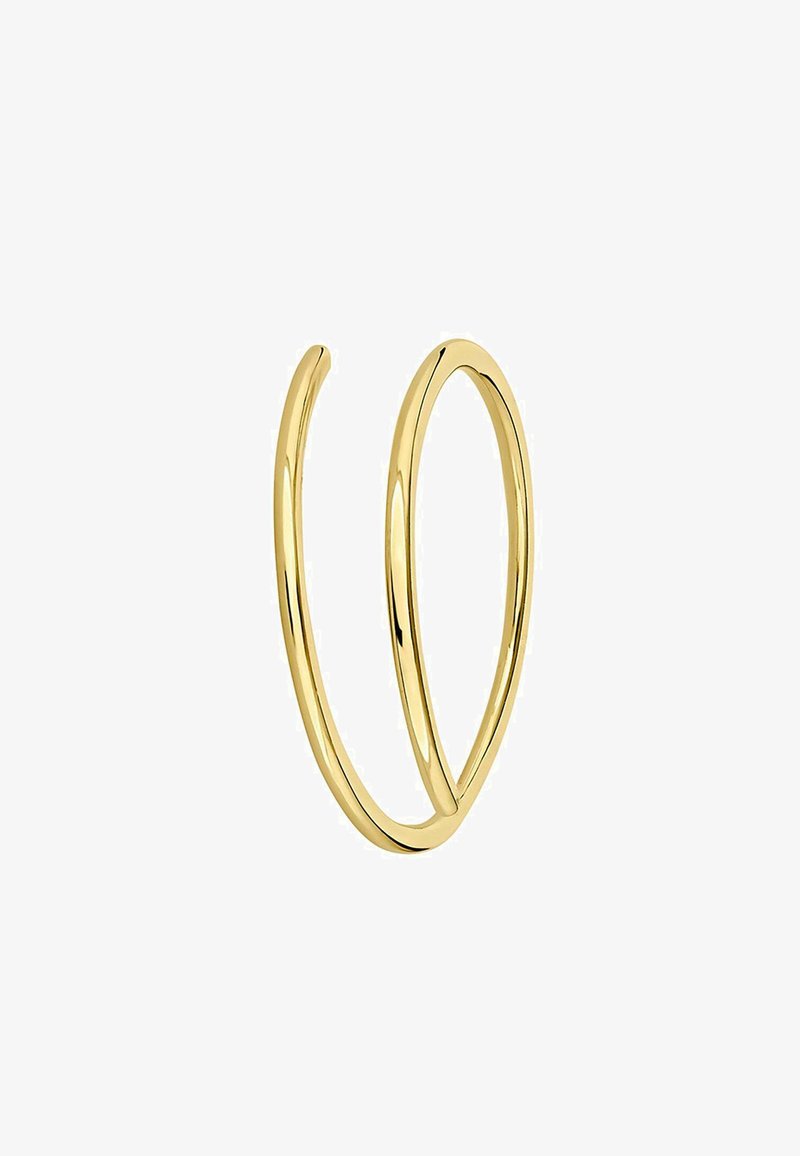 Anillo de espiral de oro pulido delgado con un extremo abierto, diseñado para llevar en el dedo, sobre un fondo blanco liso.