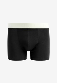 Schwarze Baumwoll-Boxershorts mit einem hellen elastischen Taillenbund, der mit "NEXT" beschriftet ist. Sie haben eine glatte Textur und eine enge Passform.