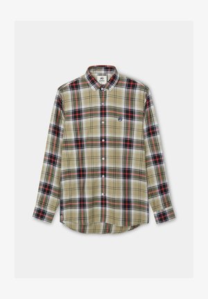 Camisa de manga larga a cuadros en tonos beige, verde, rojo y negro. Cuello abotonado y tapeta frontal. Cuenta con un parche de logo circular en el pecho.