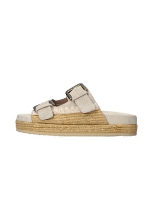 Sandalo beige tipo slide con suola platform intrecciata e due ampie fasce regolabili fissate con fibbie in metallo.