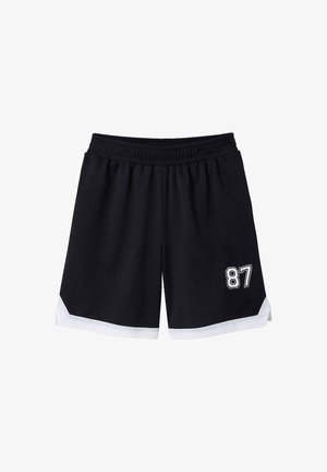 Black athletic shorts with white trim at the hem and the number 87 printed in white on the right leg.