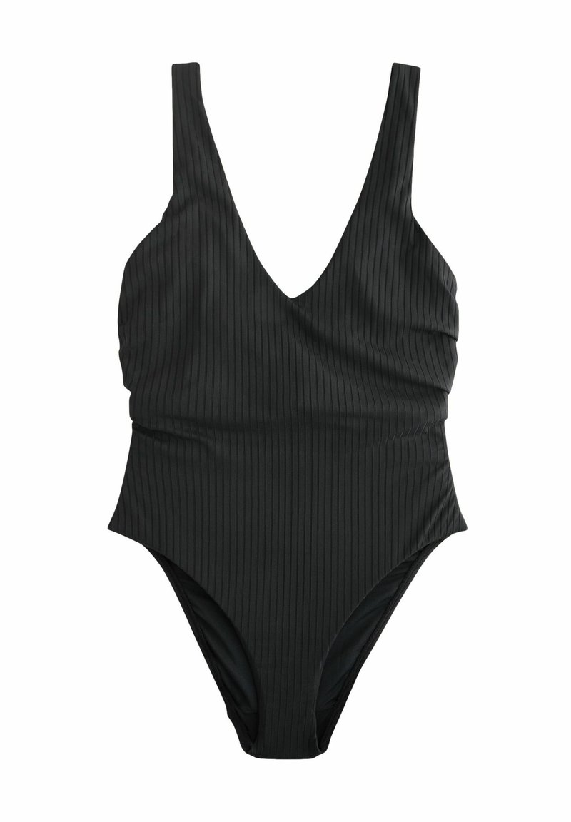 Costume da bagno intero nero con scollatura a V profonda, texture a coste, gambe alte e dettagli arricciati sui lati. Materiale leggero.