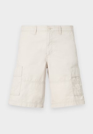Beige cargo shorts made from lightweight cotton, featuring two side pockets, a front button closure, and stitch detailing.