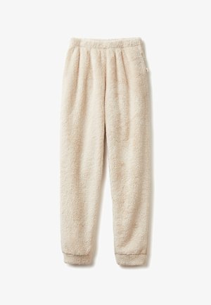 Pantaloni lounge in fleece di colore beige chiaro, con una superficie soffice e testurizzata, cintura elastica e polsini aderenti alle caviglie.