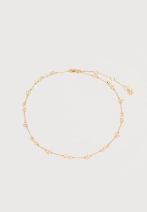 Λεπτό χρυσό κολιέ με μικρές συγκεντρωμένες χάντρες που μοιάζουν με μαργαριτάρια και ρυθμιζόμενο κούμπωμα με κρεμαστό κόσμημα σε σχήμα ήλιου.