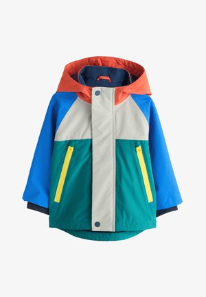 Children's color-block rain jacket with orange hood, blue sleeves, beige chest, green body, and yellow zipper pockets.