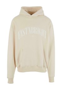 Bežová mikina s kapucňou vyrobená z mäkkého materiálu, s predným klokaním vreckom a bielym grafickým potlačou "FASTNBRIGHT" naprieč hrudníkom.