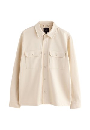 Beige langærmet skjortejakke med krave, forside med knapper og to brystlommer med klapper og knapper.