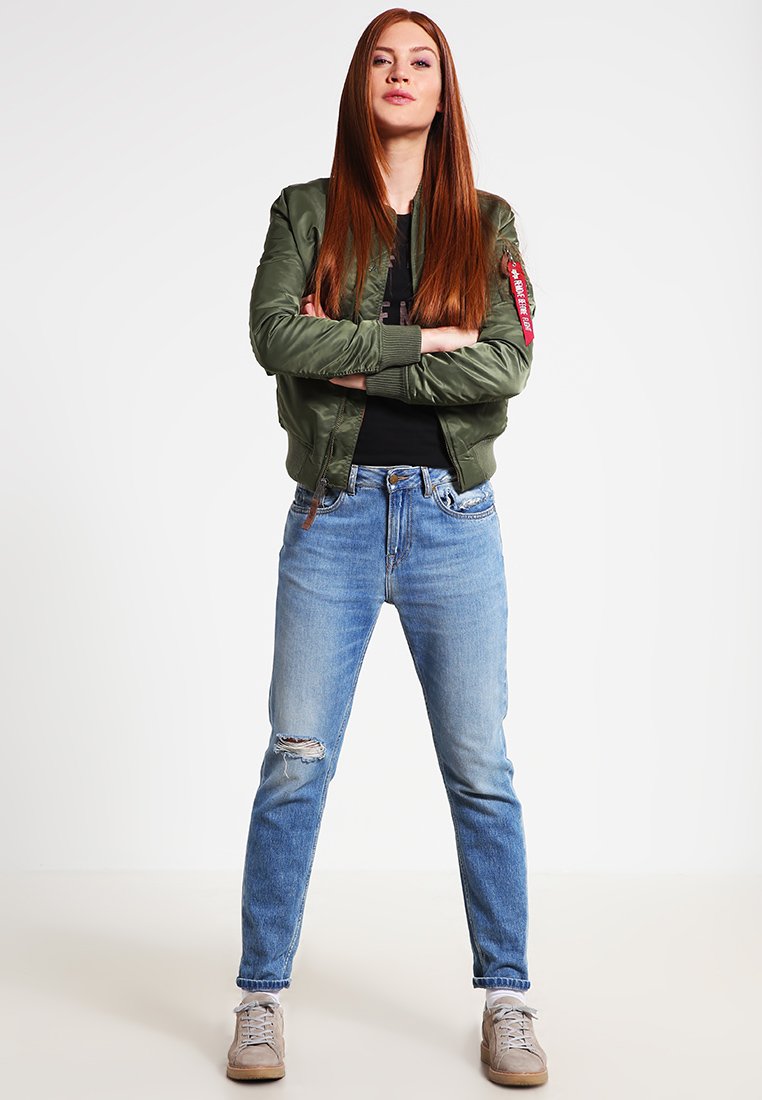 bomber jacket with red tag