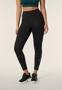 Freddy Leggings - black all flow green bronze