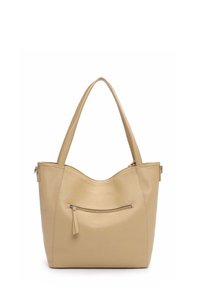 Beige leather tote bag with a curved top, two shoulder straps, and a front zippered pocket. Features a textured surface and clean lines.