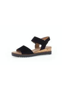 Zwarte suède sandaal met kurken wedge hak, voorzien van kruiselings straps en open teen ontwerp, getextureerde rubberen zool en verstelbare enkelband.