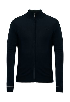Schwarzer Reißverschluss-Pullover mit hohem Kragen, aus weichem Stoff, mit enganliegenden Ärmeln und einem minimalen Logo auf der Brust.