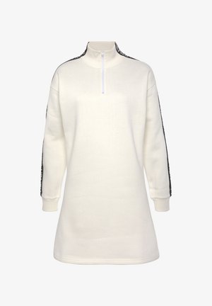 Weißes Pulloverkleid mit hohem Kragen und Reißverschluss. Mit langen Ärmeln und schwarzen Akzentstreifen an den Seiten. Weicher Stoff.