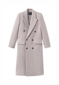 Lysegrå dobbeltradet frakke lavet af blødt stof, med en hakket krave, to forlommer og mørke knapper til lukning.