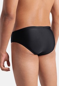 Arena OPENINGS - Costume da bagno a slip - black-turquoise