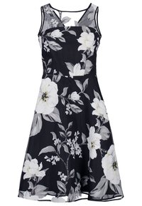 Abito senza maniche floreale con sfondo nero, decorato con grandi fiori bianchi e grigi, vita aderente e gonna ampia.