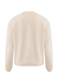 Světle béžový svetr s kulatým výstřihem, dlouhými rukávy a volným střihem. Materiál působí měkce a má hladkou texturu.