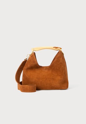 Brown suede handbag with a gold-tone handle and a detachable shoulder strap. Features a structured, angular design and smooth texture.
