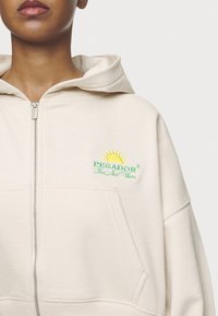 Pegador Mikina na zip - beige