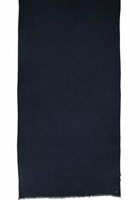 Écharpe bleu marine en tissu doux, avec un design uni et des franges sur les bords, et un petit logo décoratif dans le coin.