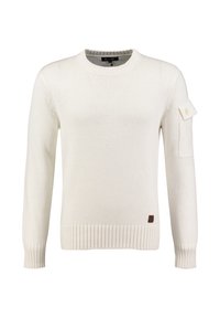 Crème trui met een geribde zoom en manchetten, ronde hals en een zakaccent op de linker mouw. Gemaakt van textiel gebreid materiaal.