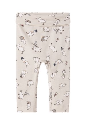 Beige Leggings mit einem elastischen Bund, die ein wiederholtes Muster von cartoonhaften Figuren und verschiedenen Accessoires in dunkleren Farben zeigen.