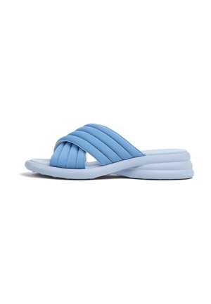 Light blue slide sandals made from soft material, featuring a quilted upper design with three crossed straps and a cushioned sole.