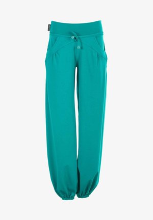 Türkiissinised, pehmed ja laiad püksid venitatava vöökoha, nööriga ja kahe ettepoole suunatud taskuga. Kääride pahkluuosa on elastne.