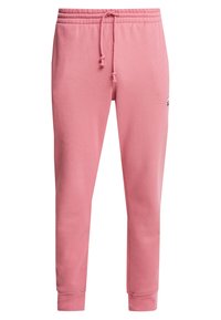 Pink sweatpants made of soft cotton blend, featuring an elastic waistband with drawstring and tapered ankles. Includes a small logo accent.